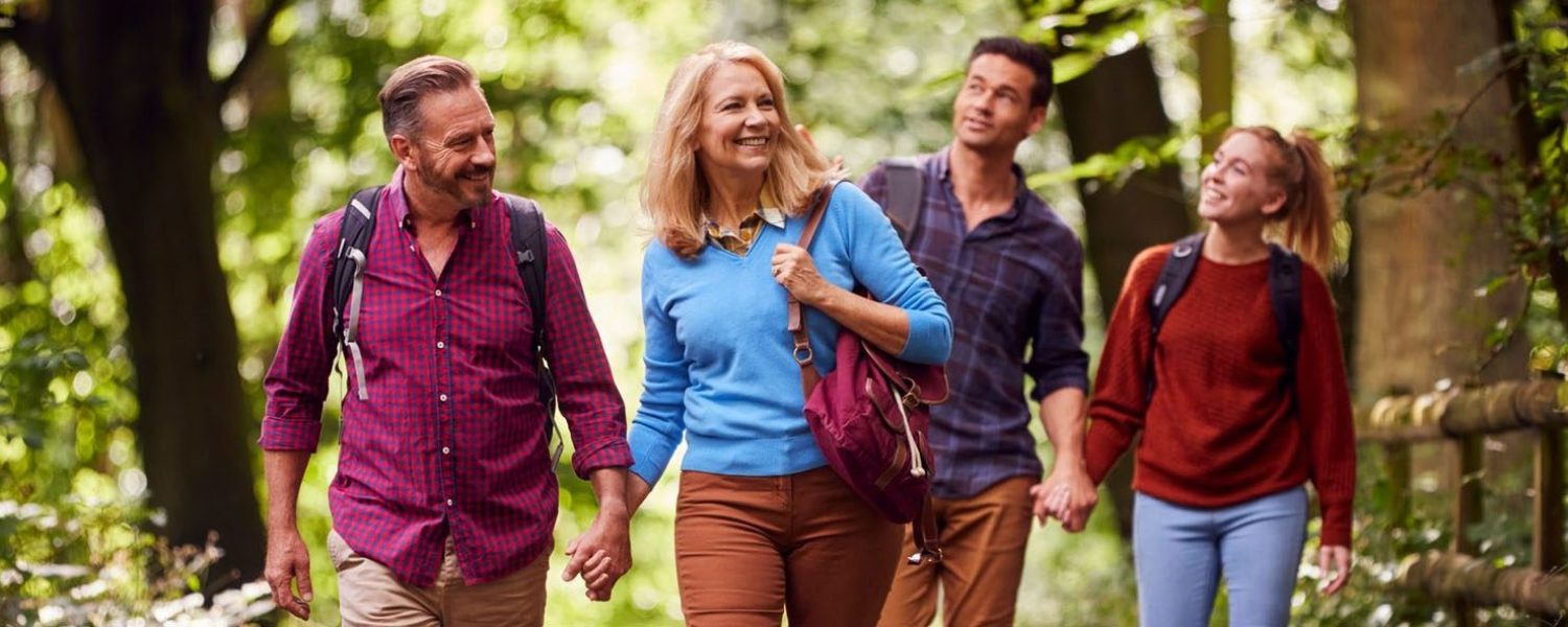 Group enjoying a woodland walk in the sunshine by Old Thorns Hotel & Resort.